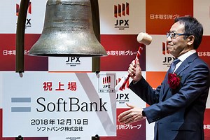 Softbank shares sink on debut