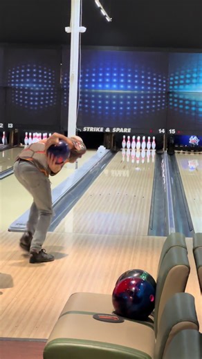 Throwing a Bowling Ball with Two Hands: Is it Weird?