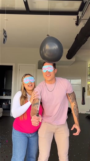 Watch the exploding balloons gender reveal surprise