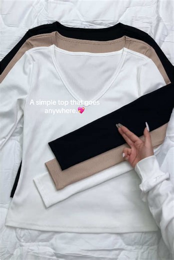 Effortlessly pulled together. This slim-fit V-neck is your everyday secret for looking smart without trying. #vnecktop #basictop #casualwear #womensfashion #everydayoutfit
