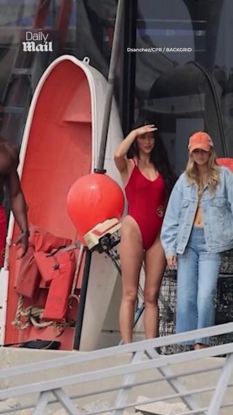 Shay Mitchell dons iconic red swimsuit for Baywatch reboot