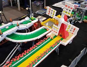 Dozens of LEGO modules are hooked together to create this mesmerizing great ball contraption displayed at Bricktober 2021! Video by Lawrie George http://bit.ly/2Tiez3f | Beyond the Brick
