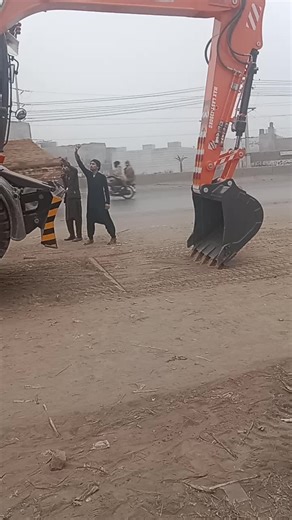 DOOSAN DX-140W Excavator in Action at Construction Site