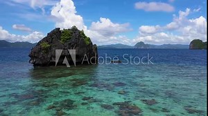 Aerial view of beautiful karst scenery and turquoise ocean water around El Nido, Palawan, Philippines. famous for its island hopping and snorkeling tours to secluded beaches and lagoons