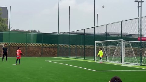 Unlucky moment ball hits crossbar and flies up before bouncing off unaware keeper's head into goal