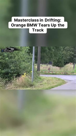 Witness pure car control! This orange BMW, sporting the number 21, shows *exactly* what a masterclass in drifting looks like, carving up that rural track with precision and an insane smoke show. That controlled slide around the corner? It’s pure driving poetry, showcasing skill that belongs in any 'Best of' compilation. Seriously impressive machine handling! #BMWDriving #Drifting #CarControl #TrackDay #SmokeShow