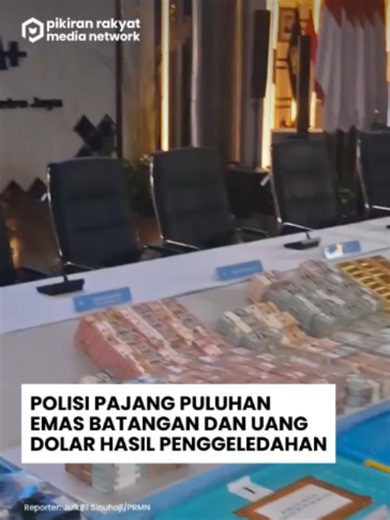 Polisi Pajang Puluhan Emas Batangan dan Uang Dolar Hasil Penggeledahan Pihak kepolisian memajang barang bukti hasil penggeledahan berupa tumpukan emas batangan hingga uang kertas dengan mata uang rupiah, dolar AS dan dolar SGD di Mapolda Metro Jaya, Jakarta, Jumat, 10 Juli 2026. Barang bukti ini adalah hasil penggeledahan tim gabungan Polri di sejumlah titik di wilayah di Cipete, Jakarta Selatan hingga Sentul, Bogor terkait dugaan kasus korupsi batu bara di PLN, ASABRI, dan utang Krakatau Steel.