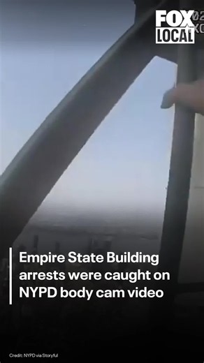 The NYPD released body cam video of the arrests of two suspects atop the Empire State Building on Wednesday.
