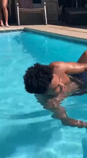 A risky stunt attempt ended painfully Saturday afternoon when a man trying to jump into a swimming pool from a rooftop hesitated mid-run and fell onto the concrete below, prompting an emergency response from first responders. Witnesses said the man had climbed onto the roof of a residential building overlooking a backyard pool and appeared to be psyching himself up for the jump. As friends watched from below, he began running toward the edge but suddenly slowed and appeared to second-guess the l