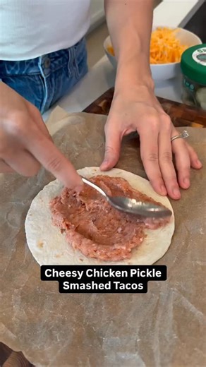 Smashed tacos, but for our pickle lovers out there. 😉🥒 These Cheesy Chicken Pickle Smashed Tacos are tangy, savory, and a snap to make. Click the link in the @allrecipes bio for the full recipe details! 💚🌮 Taco Ingredients: 1 pound ground chicken 1 teaspoon garlic powder 1 teaspoon onion powder 1 teaspoon smoked paprika 1/2 teaspoon salt 1/2 teaspoon ground black pepper 6 small (street taco size) flour tortillas 3/4 cup shredded mozzarella or Mexican blend cheese, or more to taste dill pickl