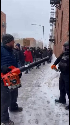 Tulsa Community Reports (formerly Tulsa Area Breaking News) | BREAKING NEWS: Video shows a protester blasting bright orange powder from a leaf blower at a masked individual holding a spray can. The... | Instagram