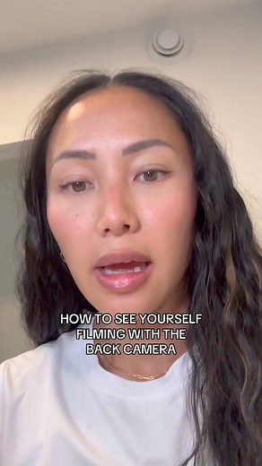 7.3K views · 75 reactions | The best iPhone hack to film with your back camera, to actually see yourself and level up your content ✨ I have always wanted to film certain videos with the back camera because its just SO much clearer. I haven't filmed with the front camera since discovering this hack!!  #iphonehacks #applehacks #appletips #iphonetricks #backcamera #contentcreatortips #contenttips #iphonetips #smallbusinesstips #iwastodayyearsold | XXL Scrunchie & Co | Facebook