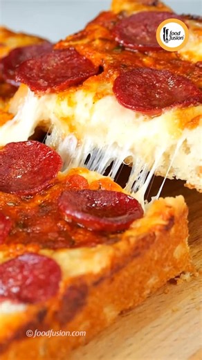 Indulge in the delicious flavors of this Detroit-style Pepperoni Pizza, loaded with gooey cheese and pepperoni. Try this recipe at home and experience the perfect blend of crunch and cheesy goodness! 🍕 #DetroitStylePizza #PepperoniPizza #FoodFusion #HappyCookingToYou #QuickFoodRecipe | Food Fusion