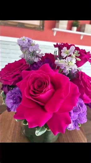 Hot pink and purple flower arrangements a moment of beauty in motion!