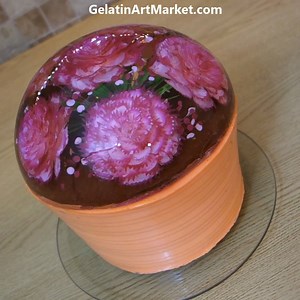 Refreshing fruit-flavored jelly pairs well with rich chocolate cakes. Learn how to make these delicious flower cakes at: GelatinArtMarket.com Free online class available. | Gelatin Art Market