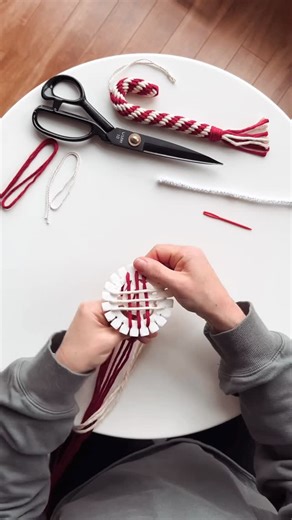 Midnight Knots | Erin - Handmade Modern Macrame on Instagram: "Watch me make a kumihimo candy cane. While this isn’t a tutorial, hopefully if you bought one of my kits and feel a little stuck this will help. Or if you were on the fence about it this encourages you to pick one up! Thanks for selling out the kits, I will be ready with more this weekend! Winterfest Craft Fair Highliner Plaza Conference Center, Prince Rupert BC Sunday December 7th 10am-5pm #kumihimo #candycane #candycaneornament #ma