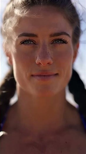 Muscle Beauty Striking a Powerful Pose on the Beach