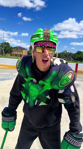 Green Machine Hockey Player Challenges Greenie on the Ice