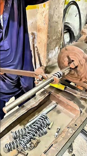 Old Industrial Method: Wire Coiled into Spring #springmaking #metalwork #traditionalskills #shorts