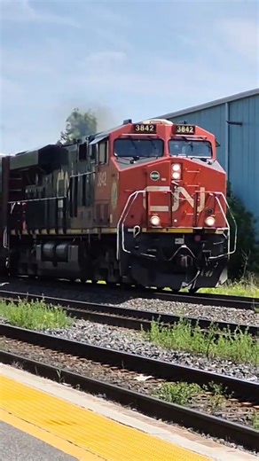 Horn blowing westbound CN freight train passes VIA station #shortvideo #shorts #short #train #foryou