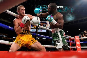 WWE Superstars and the pro-wrestling world react to Logan Paul vs. Floyd Mayweather