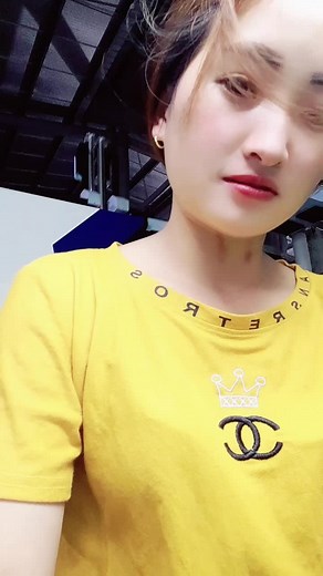 Stylish Yellow T-Shirt with Unique Chanel-Inspired Logo