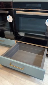 Clever kitchen storage adds functionality without compromising the design and layout. This is a great example, why is not MORE popular?!? #kitchendesign #kitcheninspiration #modernkitchen #germankitchen | Black Rok Kitchen Design