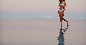 Beautiful Woman Walking Along Edge Luxury Stock Footage Video (100% Royalty-free) 1099090767 | Shutterstock