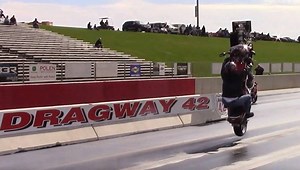 Motorcycle mishap at the starting line. The driver walked away and he looked OK, just a bit dazed. I put a quick slow motion clip after so you can see the bike literally went airborne, crazy! | Drag Racing and Car Stuff