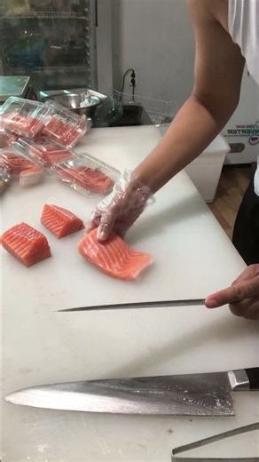 Customer bought a salmon fillet and I'm prepping it into Sashimi for them