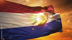 Netherlands Flag Waving Dramatically with Bright Light and Particles