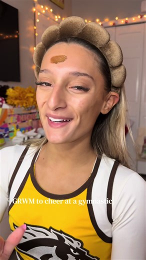 Getting Ready to Cheer at a Gymnastics Meet