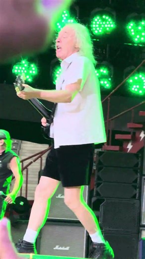 ⚡🎯 AC/DC hit harder than age – Angus Young in school uniform, the feed erupts #ACDC