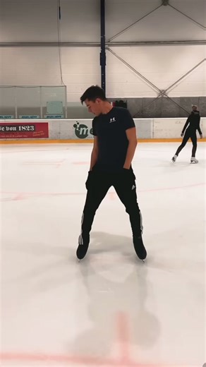 Male Figure Skater Working on Program with Dance and Spin Elements