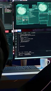 Vertical Hacker arriving in secret base with laptop, ready to start programming viruses. Scammer in criminal den opening notebook to exploit network servers and bypass security measures, camera A