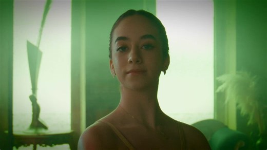 Portrait of a classic ballerina spinning slowly - Free Stock Video