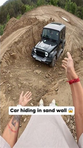 Car hiding in sand wall 😰