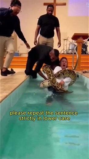 SNAKE – Giant Python Attempts to Coil Around Both People