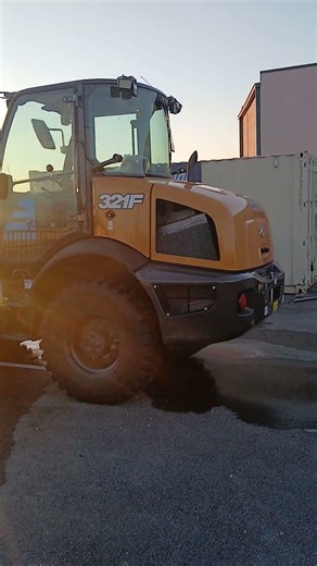 A Case mini snow plow wheel loader