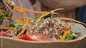 Healthy quinoa salad recipe with fresh vegetables and herbs