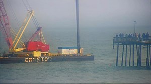 Officials postpone retrieval of vehicle that drove off Virginia Beach Fishing Pier