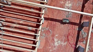 New custom home wood floor joists trusses installed on concrete block foundation