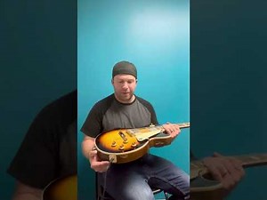 How to play a Gibson Les Paul guitar.