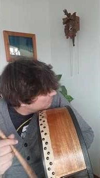 Bodhran drum playing with heavy stick