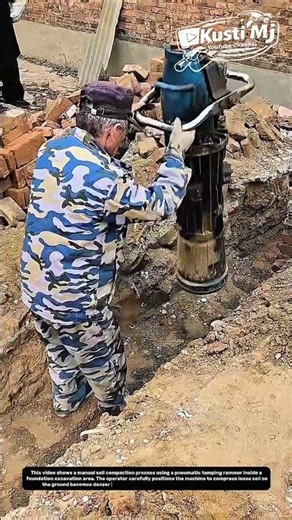 Manual Soil Compaction with a Pneumatic Rammer for Stronger Foundations.