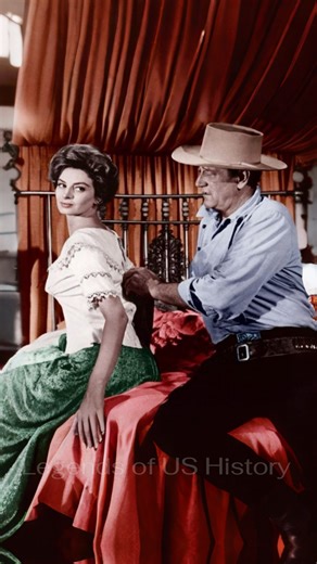 The fight for gold and the fight for the girl! In North to Alaska, John Wayne and Capucine created a romantic Western comedy where Capucine’s unexpected charm conquered the heart of the rugged prospector. | Legends of US History