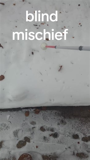 blonde girl drawing with her cane