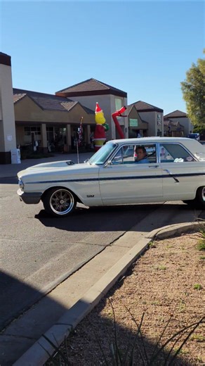 restomod ford Fairlane with modern coyote 5.0 engine swap leaving classic car meet