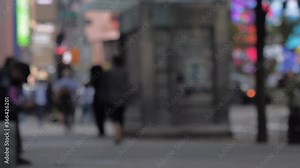 blurred unrecognized people coming back to work NYC USA