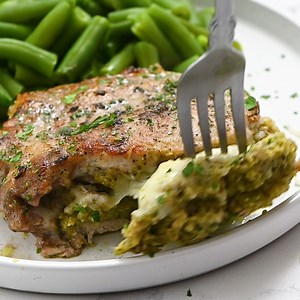 Recipe here: https://therecipecritic.com/stuffed-pork-chops/ These cheesy stuffed pork chops are juicy and tender and baked to perfection! These not only make any dinner look fancy but they also taste amazing! | The Recipe Critic